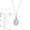 Zales Oval Opal And 1/10 Ct. T.W. Diamond Frame Drop Pendant In 10K White Gold Necklaces