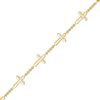 Zales 1/8 Ct. T.W. Diamond Sideways Gothic-Style Cross Station Bracelet In 10K Gold 7.25" Bracelets