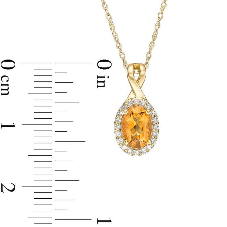 Zales Oval Citrine And 1/15 Ct. T.W. Diamond Frame Pendant In 10K Gold Necklaces