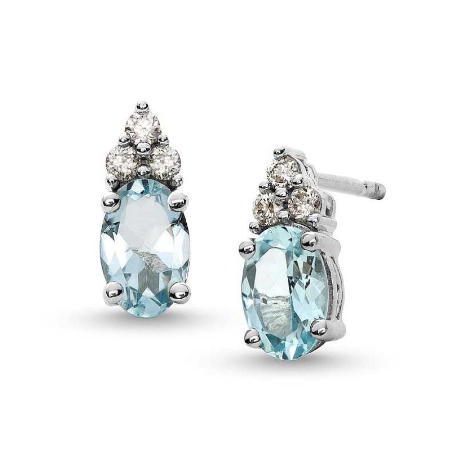 Zales Oval Aquamarine And 1/10 Ct. T.W. Diamond Stud Earrings In 10K White Gold Earrings