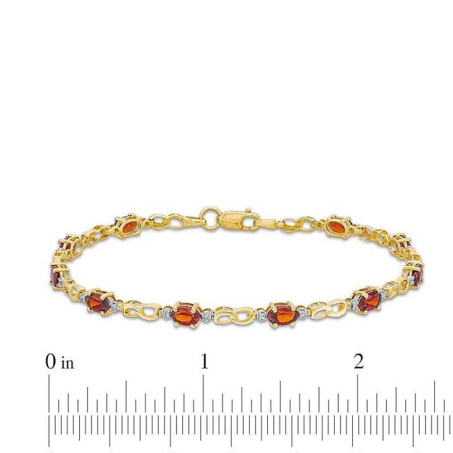 Zales Oval Lab-Created Ruby, Diamond Accent And Rice Bead Alternating Bracelet In 10K Gold - 7.25" Bracelets