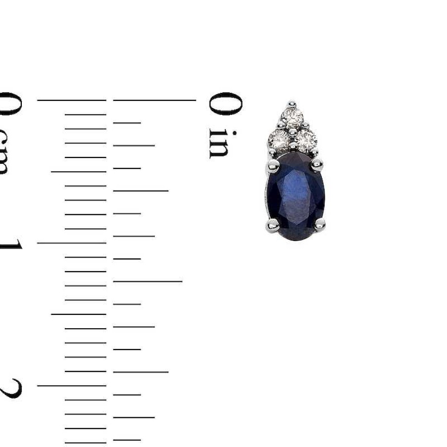 Zales Oval Blue Sapphire And 1/10 Ct. T.W. Diamond Stud Earrings In 10K White Gold Earrings