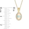 Zales Oval Opal And 1/15 Ct. T.W. Diamond Frame Pendant In 10K Gold Necklaces