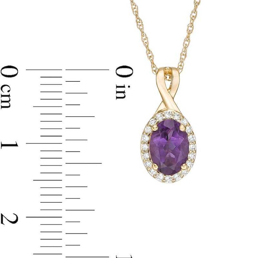 Zales Oval Amethyst And 1/15 Ct. T.W. Diamond Frame Pendant In 10K Gold Necklaces