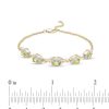 Zales Oval Peridot And Diamond Accent Twist Five Stone Bracelet In 10K Gold 8.0" Bracelets