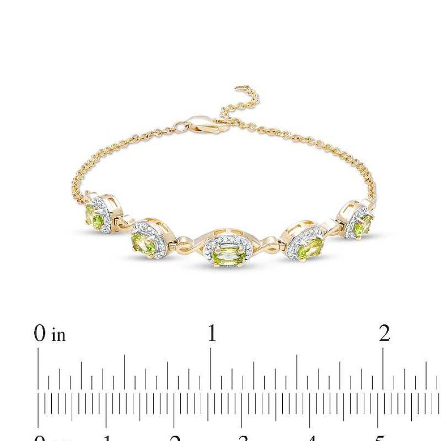 Zales Oval Peridot And Diamond Accent Twist Five Stone Bracelet In 10K Gold 8.0" Bracelets