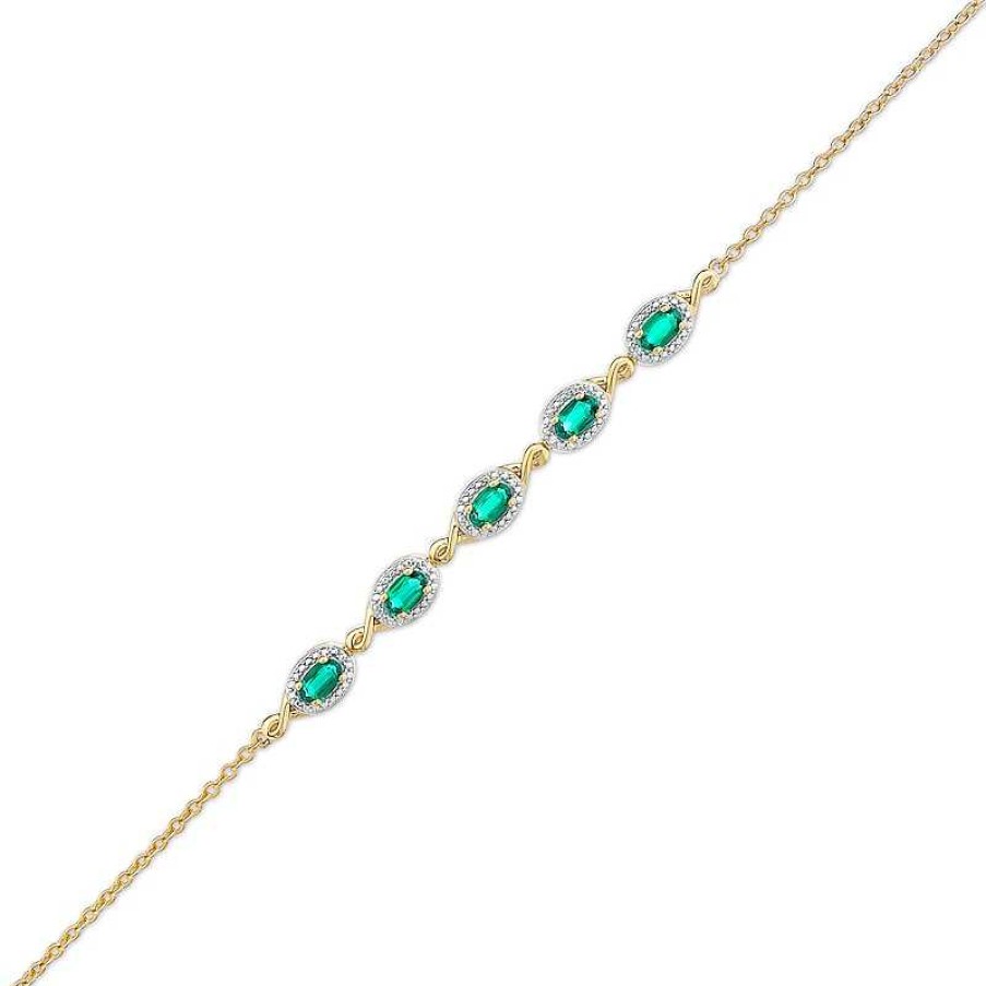 Zales Oval Emerald And Diamond Accent Twist Five Stone Bracelet In 10K Gold 8.0" Bracelets