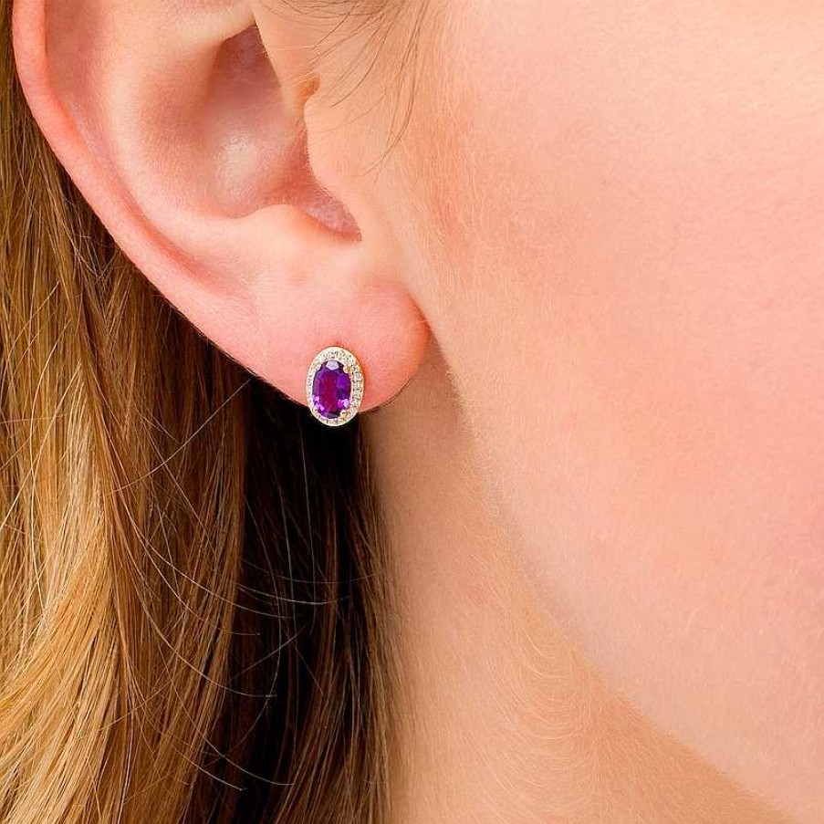 Zales Oval Amethyst And 1/10 Ct. T.W. Diamond Frame Stud Earrings In 10K Gold Earrings