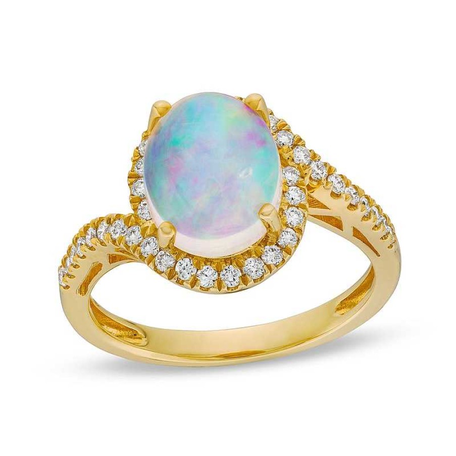 Zales Oval Opal And 1/3 Ct. T.W. Diamond Swirl Bypass Frame Ring In 10K Gold Rings