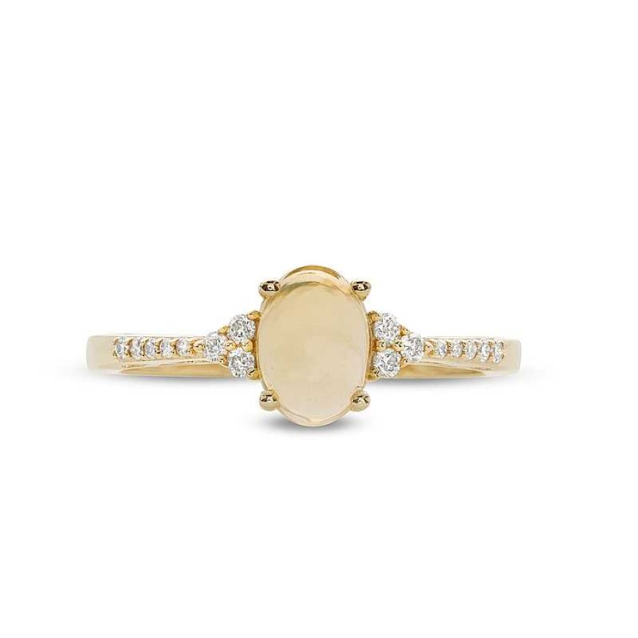 Zales Oval Opal And 1/10 Ct. T.W. Diamond Ring In 10K Gold Rings