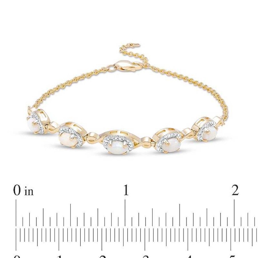 Zales Oval Opal And Diamond Accent Twist Five Stone Bracelet In 10K Gold 8.0" Bracelets