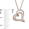 Zales 1/4 Ct. T.W. Diamond Tilted Double Heart Pendant In 10K Rose Gold Necklaces