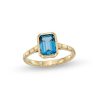 Zales Emerald-Cut London Blue Topaz Solitaire Ribbed Shank Ring In 10K Gold Rings