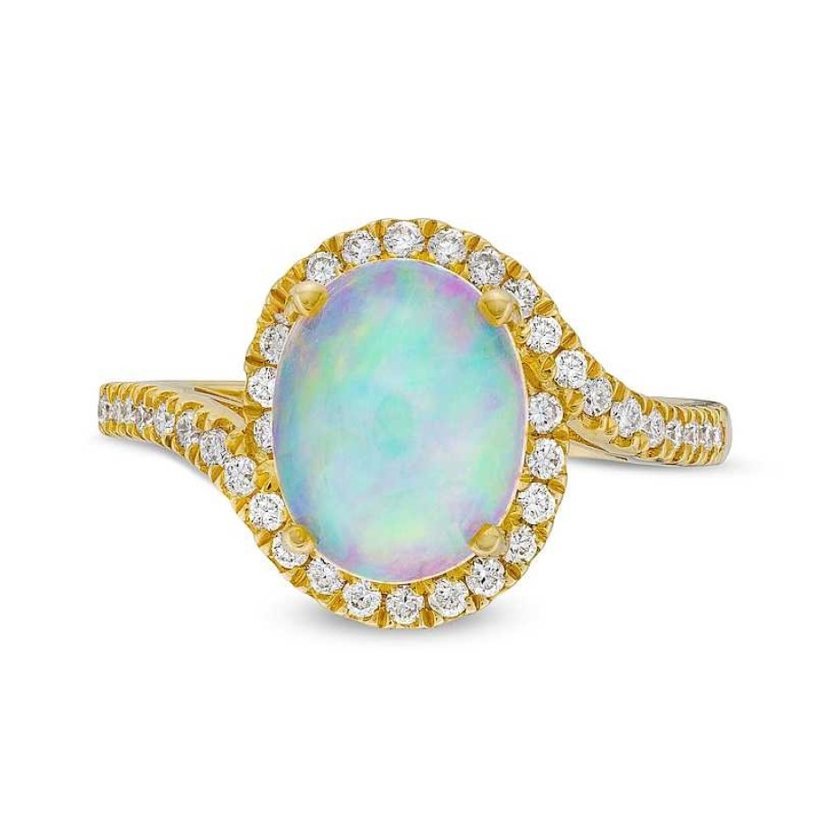 Zales Oval Opal And 1/3 Ct. T.W. Diamond Swirl Bypass Frame Ring In 10K Gold Rings