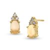 Zales Oval Opal And 1/10 Ct. T.W. Diamond Stud Earrings In 10K Gold Earrings