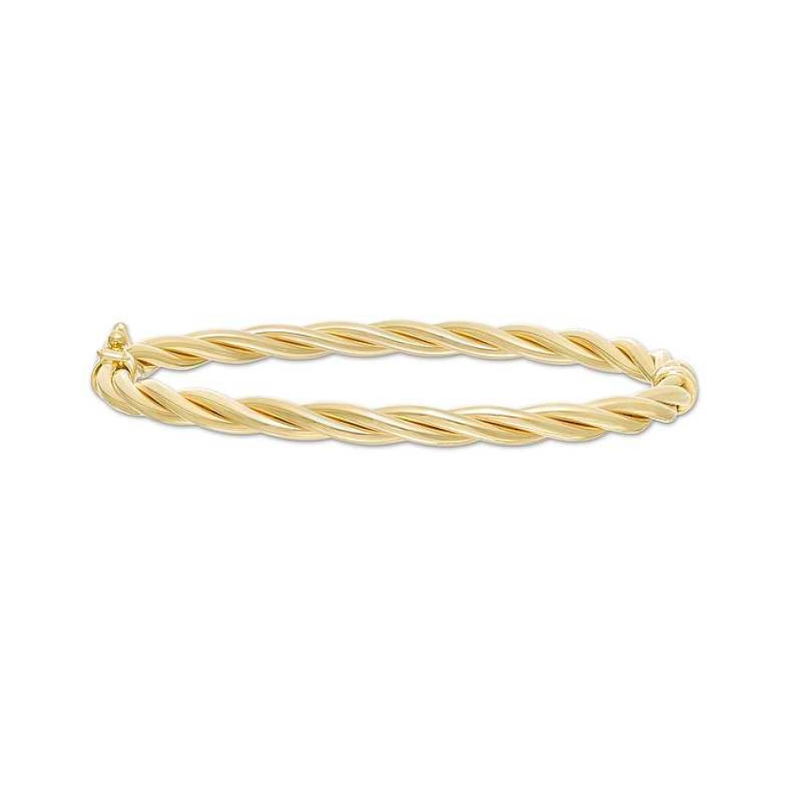 Zales Italian Gold 60.0 X 50.0 X 4.0Mm Twist Bangle In Hollow 14K Gold Bracelets