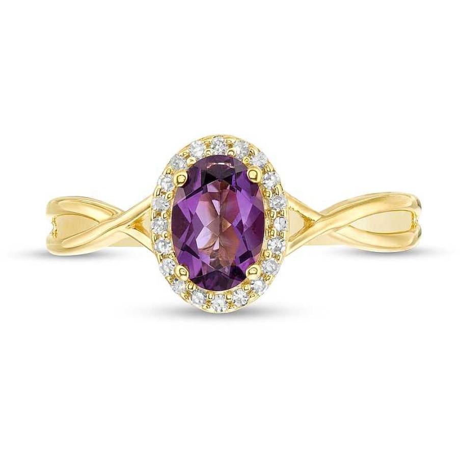 Zales Oval Amethyst And 1/15 Ct. T.W. Diamond Frame Twist Shank Ring In 10K Gold Rings