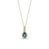 Zales Pear-Shaped London Blue Topaz And 1/8 Ct. T.W. Diamond Frame Twist Pendant In 10K Gold Necklaces