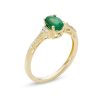 Zales Oval Emerald And 1/10 Ct. T.W. Diamond Ring In 10K Gold Rings