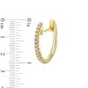 Zales 1/10 Ct. T.W. Diamond Huggie Hoop Earrings In 10K Gold Earrings