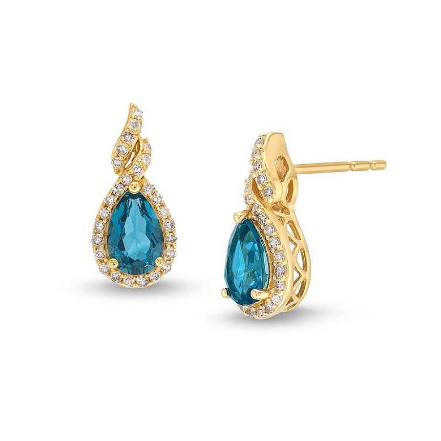 Zales Pear-Shaped London Blue Topaz And 1/6 Ct. T.W. Diamond Frame Twist Stud Earrings In 10K Gold Earrings