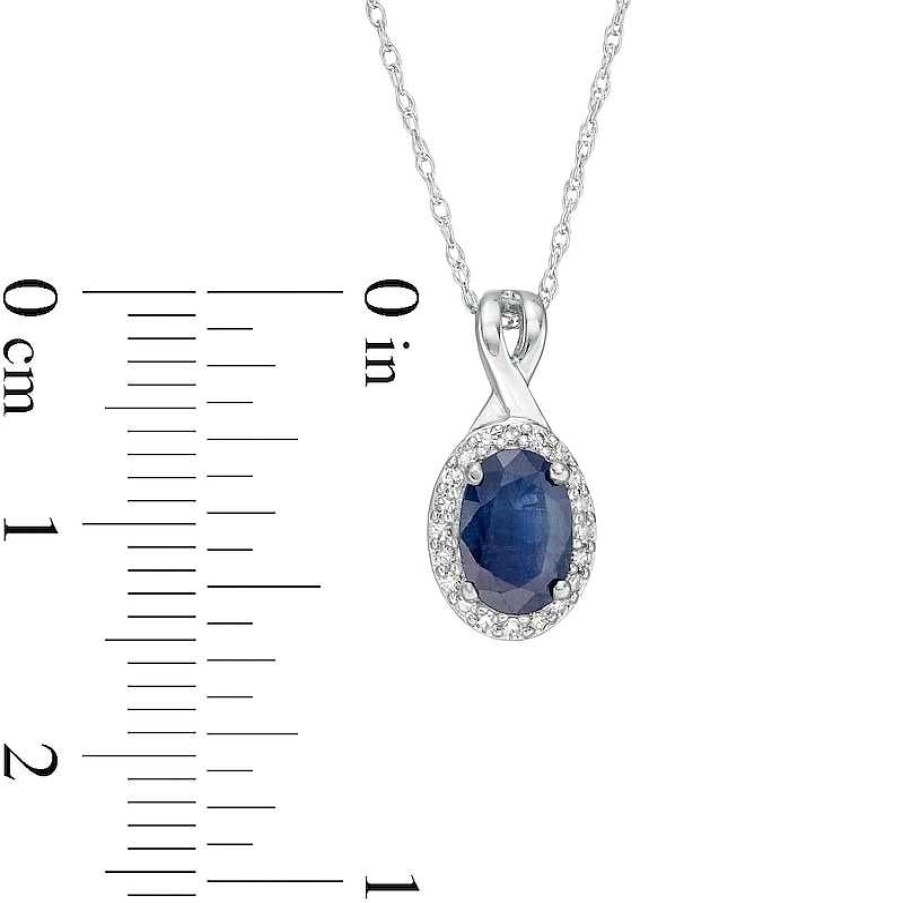 Zales Oval Blue Sapphire And 1/15 Ct. T.W. Diamond Frame Pendant In 10K White Gold Necklaces