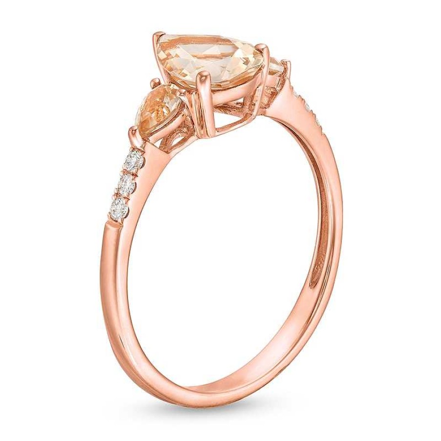 Zales Pear-Shaped Morganite And 1/15 Ct. T.W. Diamond Three Stone Ring In 10K Rose Gold Rings