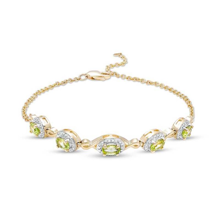 Zales Oval Peridot And Diamond Accent Twist Five Stone Bracelet In 10K Gold 8.0" Bracelets