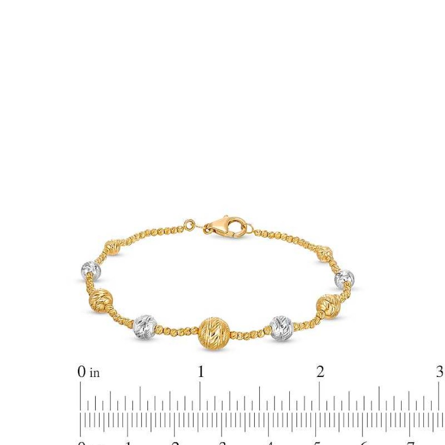 Zales Oro Diamante Graduating Brilliance Bead Bracelet In Hollow 14K Two-Tone Gold - 7.5" Bracelets