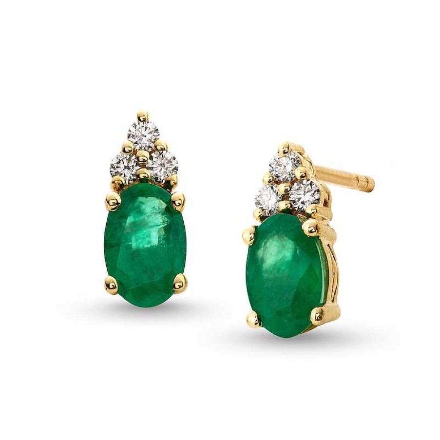 Zales Oval Emerald And 1/10 Ct. T.W. Diamond Stud Earrings In 10K Gold Earrings