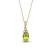 Zales Oval Peridot And 1/15 Ct. T.W. Diamond Pendant In 10K Gold Necklaces