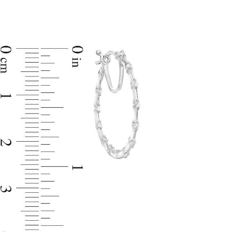 Zales 1/4 Ct. T.W. Diamond Station Inside-Out Hoop Earrings In 10K White Gold Earrings