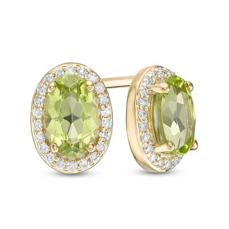 Zales Oval Peridot And 1/10 Ct. T.W. Diamond Frame Stud Earrings In 10K Gold Earrings