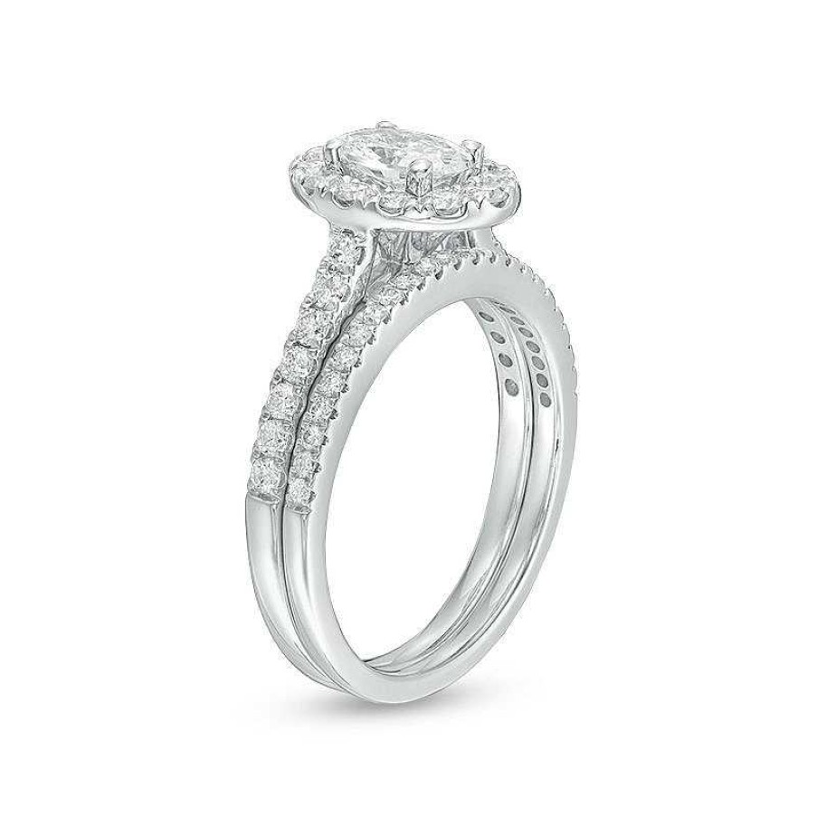 Zales Celebration Ideal 1-1/2 Ct. T.W. Oval Diamond Frame Bridal Set In 14K White Gold (I/I1) Rings