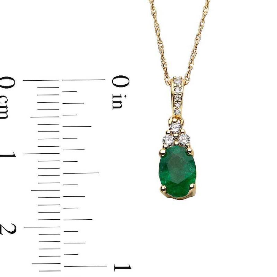 Zales Oval Emerald And 1/15 Ct. T.W. Diamond Pendant In 10K Gold Necklaces