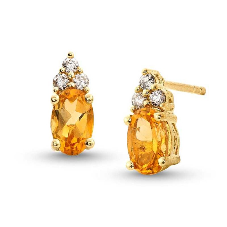 Zales Oval Citrine And 1/10 Ct. T.W. Diamond Stud Earrings In 10K Gold Earrings