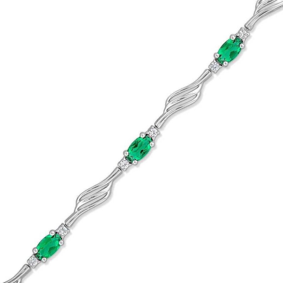 Zales Oval Lab-Created Emerald And White Lab-Created Sapphire Bypass Wave Alternating Line Bracelet In Sterling Silver Bracelets