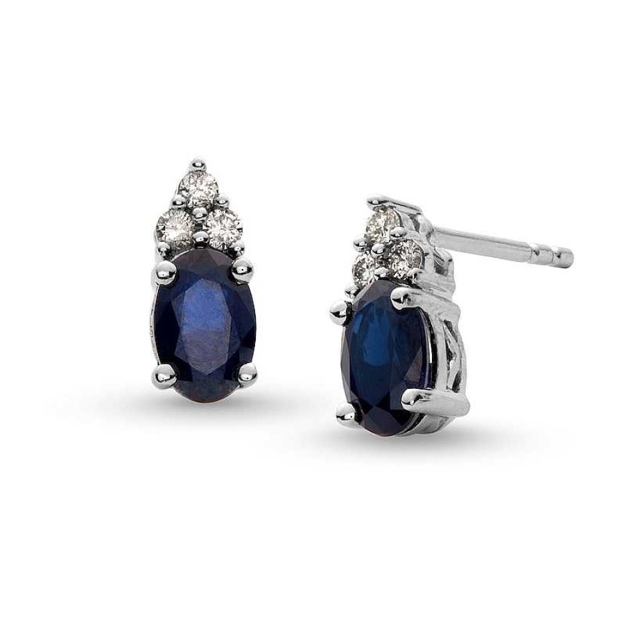 Zales Oval Blue Sapphire And 1/10 Ct. T.W. Diamond Stud Earrings In 10K White Gold Earrings