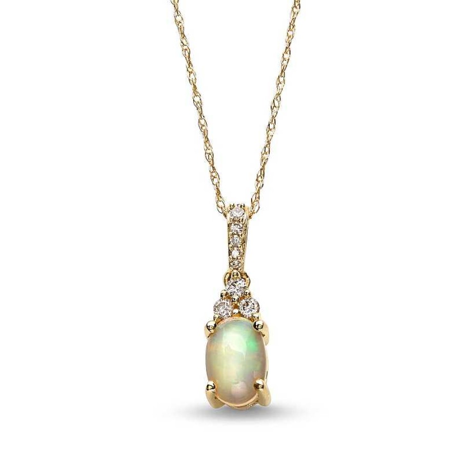 Zales Oval Opal And 1/15 Ct. T.W. Diamond Pendant In 10K Gold Necklaces