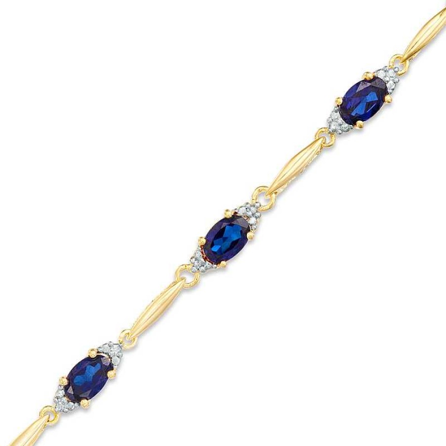 Zales Oval Lab-Created Blue Sapphire And Diamond Accent Bracelet In Sterling Silver And 10K Gold Plate- 7.25" Bracelets