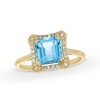 Zales Asscher-Cut London Blue Topaz And 1/10 Ct. T.W. Diamond Concave Frame Ring In 10K Gold Rings