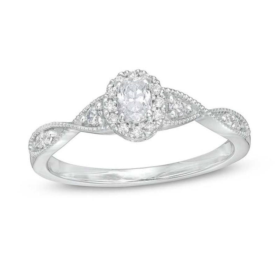 Zales 1/3 Ct. T.W. Oval Diamond Frame Twist Shank Engagement Ring In 14K White Gold (I/Si2) Rings