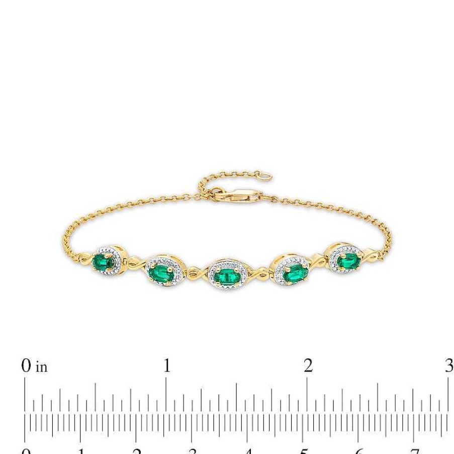 Zales Oval Emerald And Diamond Accent Twist Five Stone Bracelet In 10K Gold 8.0" Bracelets