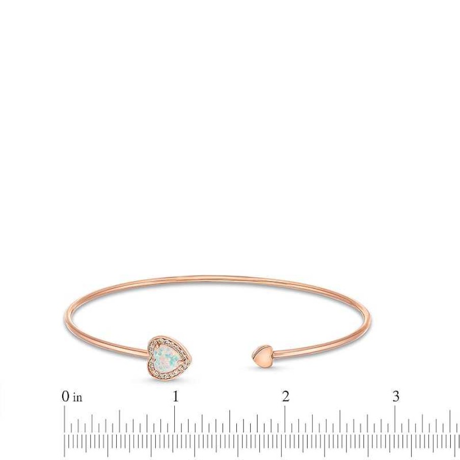 Zales 6.0Mm Lab-Created Opal And 1/10 Ct. T.W. Diamond Frame Double Heart Open Bangle In 10K Rose Gold Bracelets