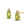 Zales Oval Peridot And 1/10 Ct. T.W. Diamond Stud Earrings In 10K Gold Earrings