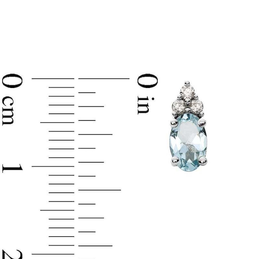 Zales Oval Aquamarine And 1/10 Ct. T.W. Diamond Stud Earrings In 10K White Gold Earrings