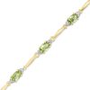 Zales Oval Peridot And Diamond Accent Bracelet In Sterling Silver And 10K Gold Plate - 7.25" Bracelets