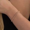 Zales 1/10 Ct. T.W. Diamond Circle Tennis Bracelet In Sterling Silver With 14K Rose Gold Plate - 7.25" Bracelets