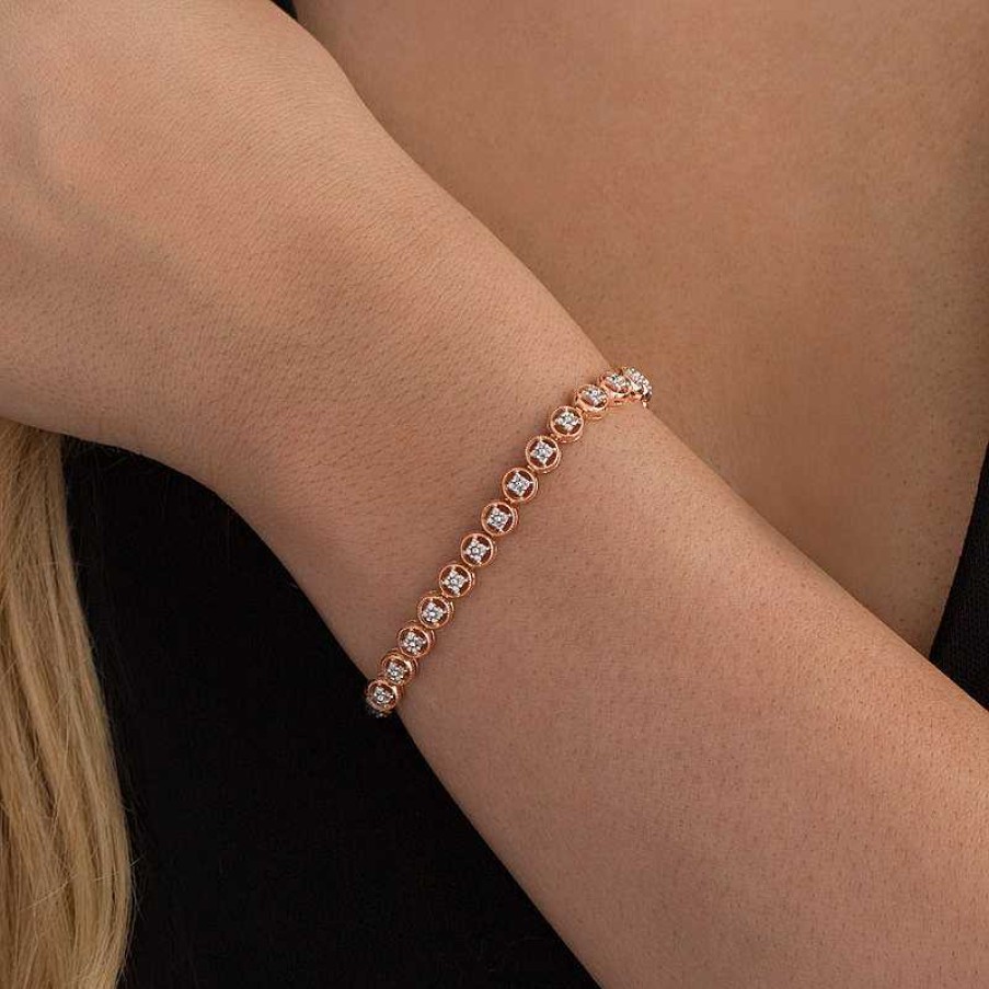 Zales 1/10 Ct. T.W. Diamond Circle Tennis Bracelet In Sterling Silver With 14K Rose Gold Plate - 7.25" Bracelets