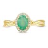 Zales Oval Emerald And 1/15 Ct. T.W. Diamond Frame Twist Shank Ring In 10K Gold Rings